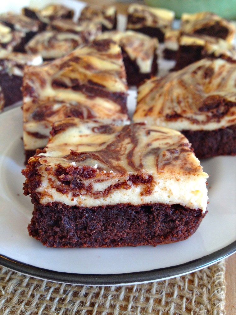Marbled Cheesecake Brownies | KellyintheKitchen  | For brownie layer: 6 tbsp butter, 1 cup semisweet chocolate chips, 3/4 cup packed brown sugar, splash of vanilla extract, 2 eggs, 1/4 cup unsweetened cocoa powder, 2 packed tbsp coconut flour, 3 tbsp potato starch (I haven’t tried it, but corn starch should work here, too), 1/2 tsp baking soda, 1/4 tsp salt. For cheesecake layer: 8 oz cream cheese, 1/4 cup granulated sugar, 1 tsp vanilla, 1 egg
