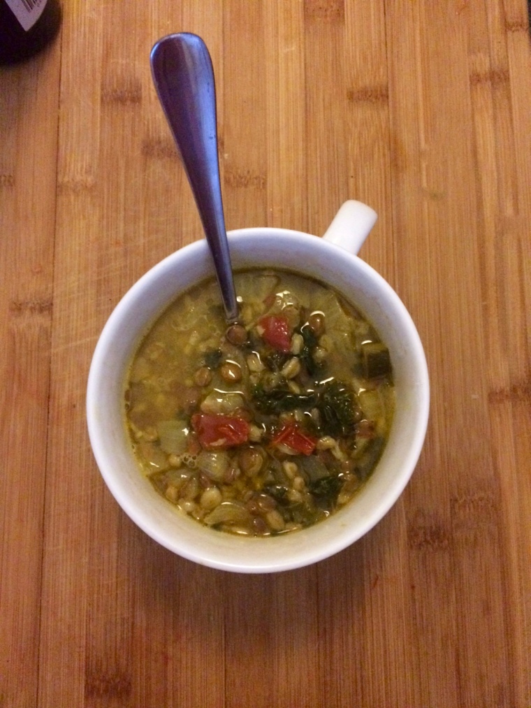 Hearty Farro and Lentil Soup with Turmeric, Parmesan, and Kale | Kelly in the Kitchen | Ingredients: butter or olive oil, onion, zucchini, garlic, tomatoes, turmeric, cumin, salt and pepper, stock or broth, bay leaf, farro, lentils, kale, parmesan rind (optional)
